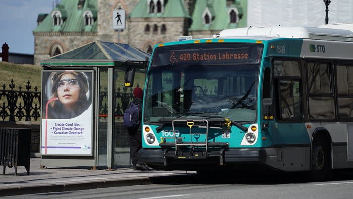 An STO bus stops at a shelter on Wellington Street in downtown Ottawa during the COVID-19 pandemic April 6, 2020.