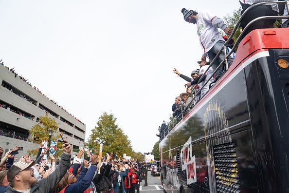 ATLANTA, GA - NOVEMBER 05: Fans cheer for the Atlanta Braves during the World Series Parade at Truist Park on November 5, 2021 in Atlanta, Georgia. The Atlanta Braves won the World Series in six games against the Houston Astros winning their first championship since 1995. (Photo by Megan Varner/Getty Images)