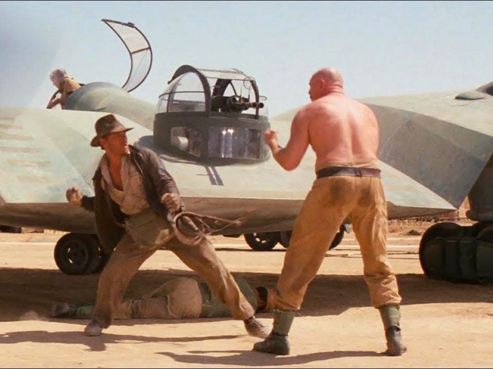 Harrison Ford as Indiana Jones fighting a henchman in "Raiders of the Lost Ark."