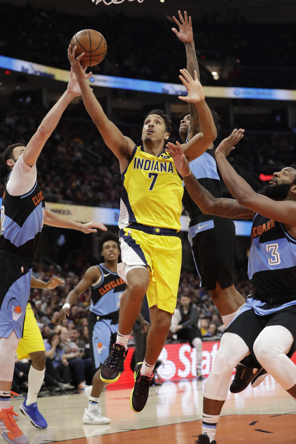 Indiana Pacers' Malcolm Brogdon (7) drives to the basket against the Cleveland Cavaliers in the second half of an NBA basketball game, Saturday, Feb. 29, 2020, in Cleveland. Indiana won 113-104. (AP Photo/Tony Dejak)