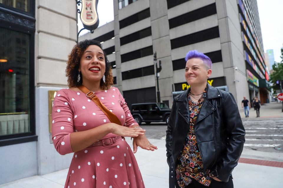 Naomi Scott, 37, of Detroit, (left) is the operations manager at the Le Supreme, a new French restaurant in the recently reopened Book Tower, and walks to dinner with her wife Lauren Scott, 38, of Detroit, in downtown Detroit on Sept. 29, 2023.