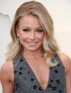 <p>Ripa is a fitness fiend, but a good sweat session isn't complete without the perfect playlist for the daytime talk show host. Her trainer told <a href="https://www.instyle.com/beauty/kelly-ripa-workout-routine" rel="nofollow noopener" target="_blank" data-ylk="slk:InStyle;elm:context_link;itc:0;sec:content-canvas" class="link "><em>InStyle</em></a>, "We are both obsessed with finding the best music. It really drives the workout."</p>