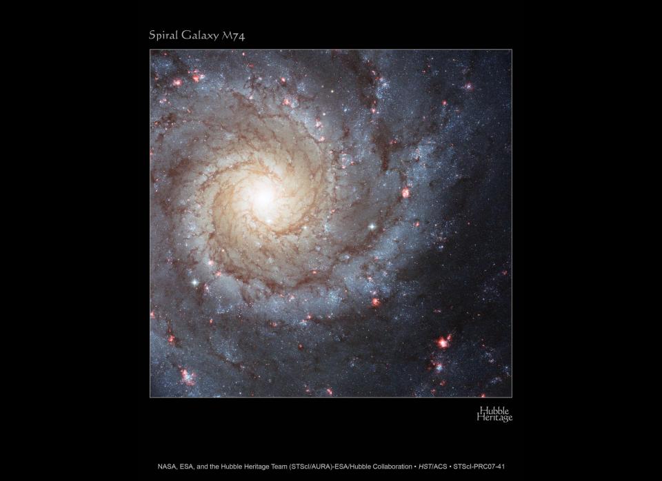 Bright knots of glowing gas light up the arms of spiral galaxy M74, indicating a rich environment of star formation. Messier 74, also called NGC 628, is slightly smaller than our Milky Way.  Credit: NASA, ESA, and the Hubble Heritage (STScI/AURA)-ESA/Hubble Collaboration  Acknowledgment: R. Chandar (University of Toledo) and J. Miller (University of Michigan)