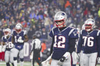 New England Patriots quarterback Tom Brady (12) walks off the field after throwing an interception to end the Patriots chances against the Tennessee Titans in an NFL wild-card playoff game, Saturday, Jan. 4, 2020 in Foxborough, Mass. The Titans defeated the Patriots 20-13. (Margaret Bowles via AP)