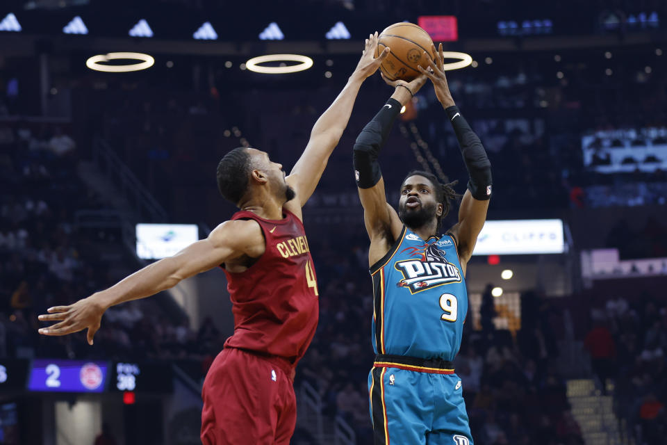 Detroit Pistons center Nerlens Noel (9) shoots against Cleveland Cavaliers forward Evan Mobley (4) during the first half of an NBA basketball game, Wednesday, Feb. 8, 2023, in Cleveland. (AP Photo/Ron Schwane)