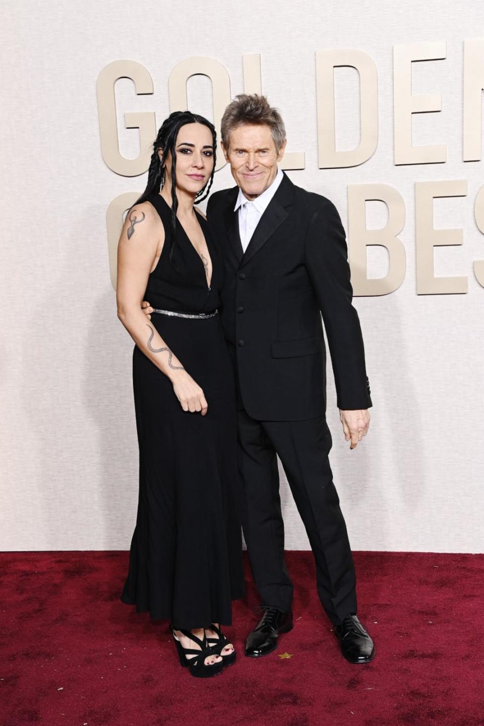 PHOTO: Giada Colagrande and Willem Dafoe attend the 81st Annual Golden Globe Awards at The Beverly Hilton, Jan. 7, 2024, in Beverly Hills, California.  (Jon Kopaloff/WireImage,)