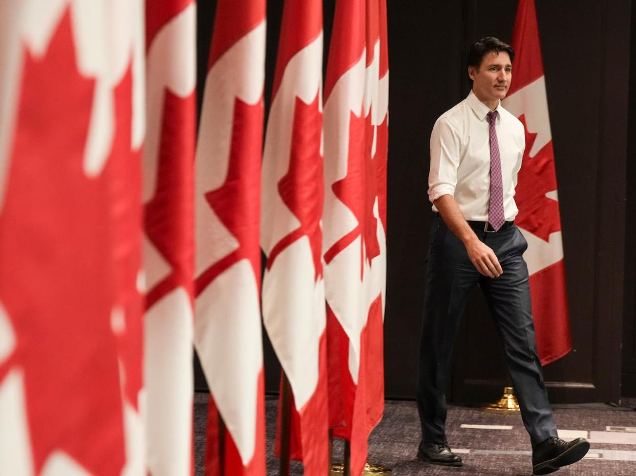 Prime Minister Justin Trudeau arrives to speak to the media at the federal cabinet retreat in Montreal on Tuesday, Jan. 23, 2024. (Christinne Muschi/The Canadian Press - image credit)