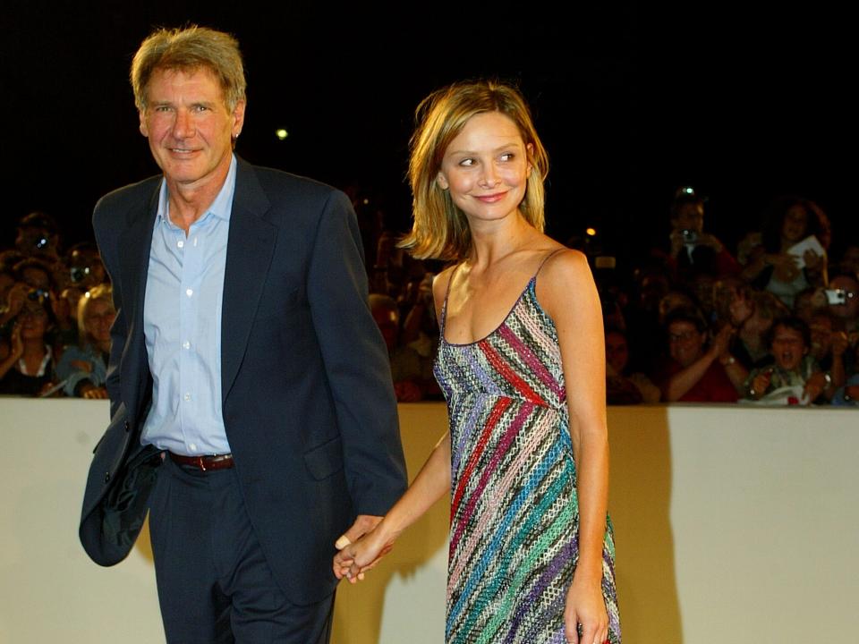 Calista Flockhart and Harrison Ford at the premiere of his film "K-19: The Widowmaker" at the 59th Venice Film Festival in 2002 in Venice, Italy.