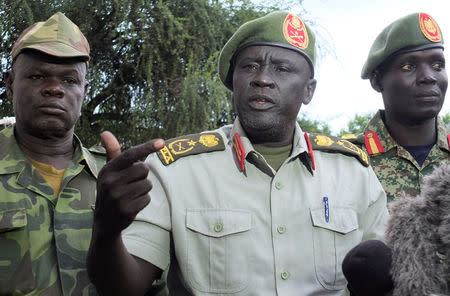 General Dau Aturjong, a senior military officer in the armed opposition faction of the Sudan People’s Liberation Movement (SPLM-IO) under the leadership of the first vice-president, Riek Machar, addresses a news conference after he defected to SPLA loyal to President Salva Kiir in South Sudan capital Juba, July 10, 2016. REUTERS/Stringer