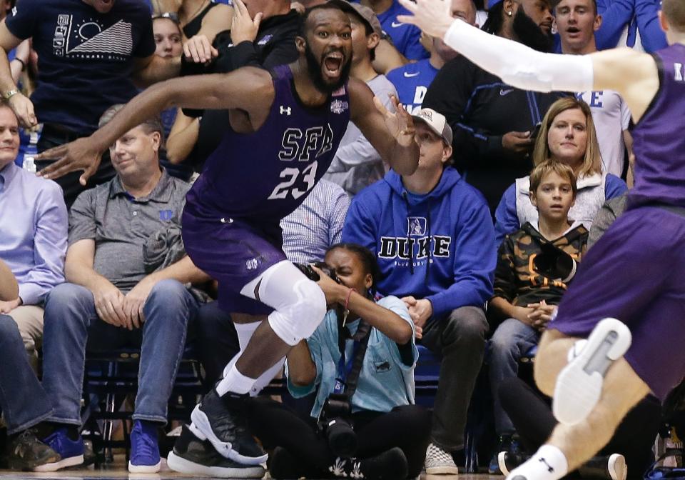 Nathan Bain choked back tears as he talked about his family after Tuesday's emotional upset of Duke. (AP Photo/Gerry Broome)