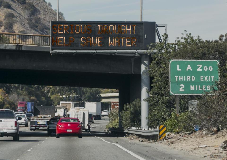 A road sign reads: "Serious Drought Help Save Water" on Interstate 5 in Los Angeles Wednesday, Feb. 12, 2014. Calif. Gov. Jerry Brown has formally proclaimed California in drought emergency, calling on Republicans and Democrats in Congress to compromise on legislation to help the state's drought-stricken agricultural heartland. (AP Photo/Damian Dovarganes)