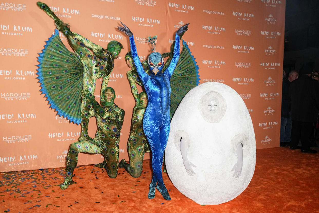 Heidi Klum and husband Tom Kaulitz couldn't have had a better costume this year. (WWD / WWD via Getty Images)