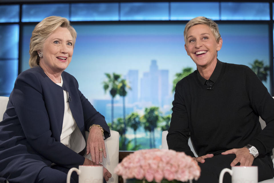 FILE - Democratic presidential candidate Hillary Clinton and Ellen Degeneres sit together during a commercial break at a taping of The Ellen Show in Burbank, Calif., on Oct. 13, 2016. DeGeneres is taking her final bow on her syndicated daytime talk show on Thursday, May 26, after almost two decades. (AP Photo/Andrew Harnik, File)