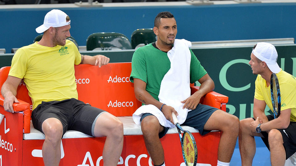 (L-R) Sam Groth, Nick Kyrgios and Team Captain Lleyton Hewitt of Australia talk tactics during practice for the Davis Cup World Group Quarterfinals between Australia and the USA at Pat Rafter Arena on April 6, 2017 in Brisbane, Australia. (Photo by Bradley Kanaris/Getty Images)