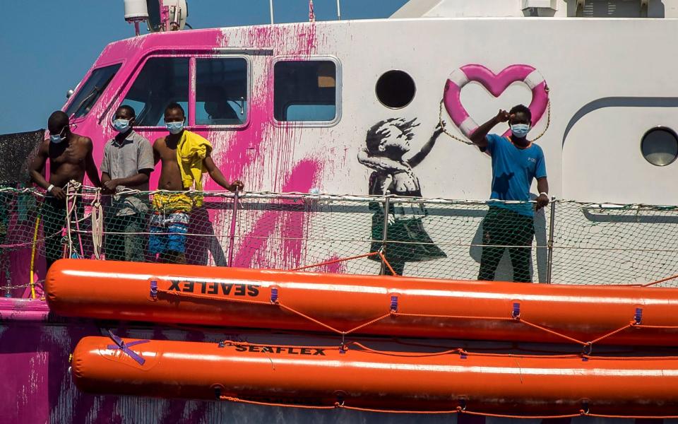 Rescued migrants on board the Louise Michel vessel - Santi Palacios/AP