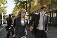 Elizabeth Holmes leaves the United States Federal Courthouse in San Jose, Calif., Wednesday, Sept. 8, 2021. Her company Theranos failed in 2018, a few years after a series of explosive stories in The Wall Street Journal exposed serious flaws in its technology and spurred regulatory investigations that shut down the testing. (AP Photo/Nic Coury)