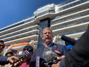 U.S. Ambassador to Cambodia W. Patrick Murphy speaks to reporters in front of the cruise ship MS Westerdam in the Cambodian port of Sihanoukville,