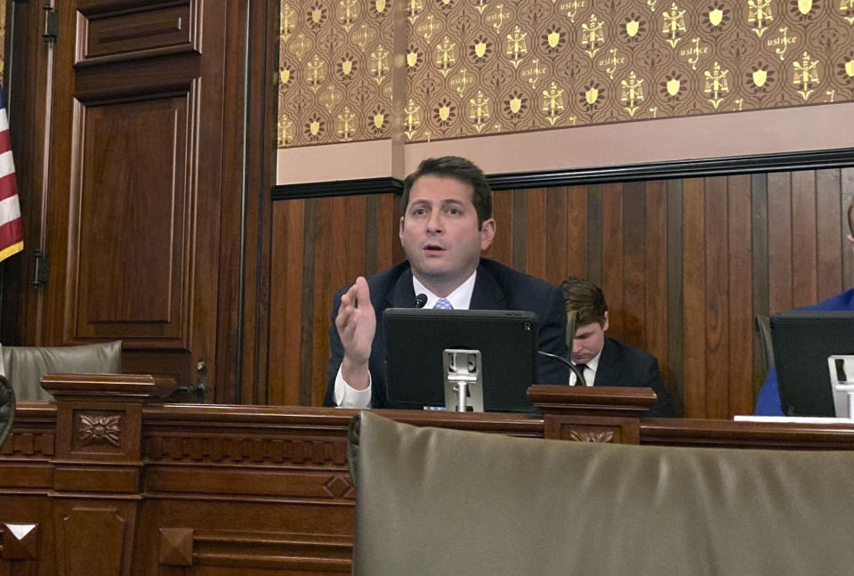 State Sen. Jason Barickman, R-Bloomington, asks questions during a committee hearing on Thursday, Dec. 1, 2022, in Springfield, Ill., about legislation to clarify the SAFE-T Act, a sweeping criminal justice overhaul that notably eliminates cash bail. Republicans worry that the law, which takes effect Jan. 1, 2023, would allow dangerous criminals out on the street when they should be detained awaiting trial. (AP Photo/John O'Connor)