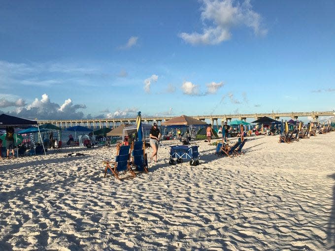 Plenty of space to set for the Blue Angels remained on Casino Beach at 7 a.m. Friday, July 8, 2022. With four hours before the civilian acts are schedule to fly, many people staked out the best spots on the sand.
