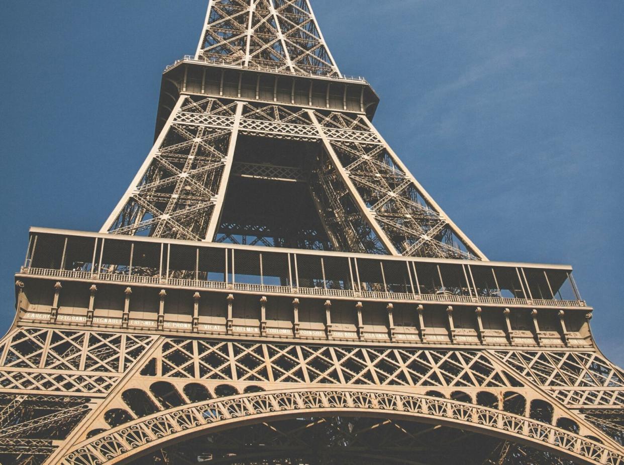 Tianducheng s a Chinese town with replicas of Paris. Travelers should check out this unique destination. pictured: a picture of the Eiffel Tower on a clear sunny day