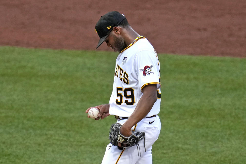 Pittsburgh Pirates starting pitcher Roansy Contreras pauses on the mound after giving up a two-run home run to St. Louis Cardinals' Nolan Arenado during the third inning of a baseball game in Pittsburgh, Friday, June 2, 2023. (AP Photo/Gene J. Puskar)