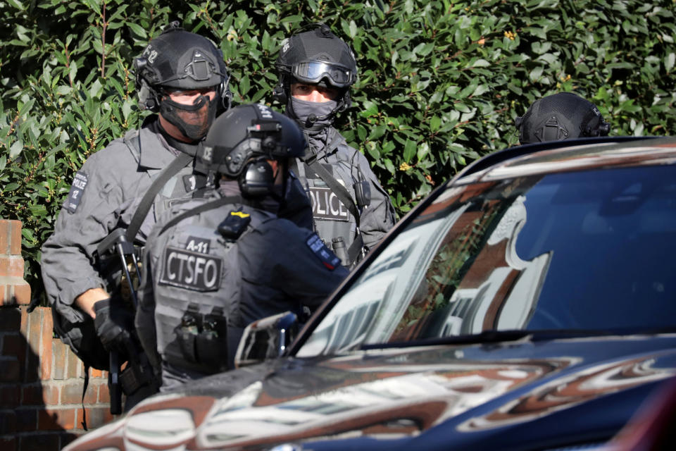 Armed officers at Parsons Green (Reuters)