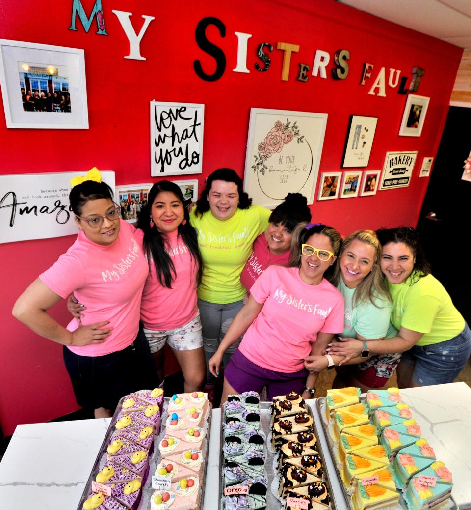 (Left to right)  Family members Maria Rosario, Sarai Roblero, Evelynn Gonzales, Angie Robles, Jesmarie Santiago, Rous Robles Lizbethmary Vargas work together as My Sister's Fault cafe/bakery on SW Front St. in Milford.