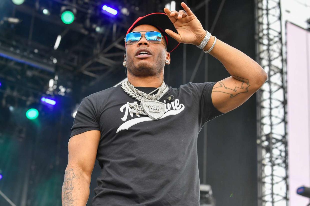 <p>Aaron J. Thornton/WireImage</p> Nelly performs during the Lovers & Friends music festival at the Las Vegas Festival Grounds in May 2023