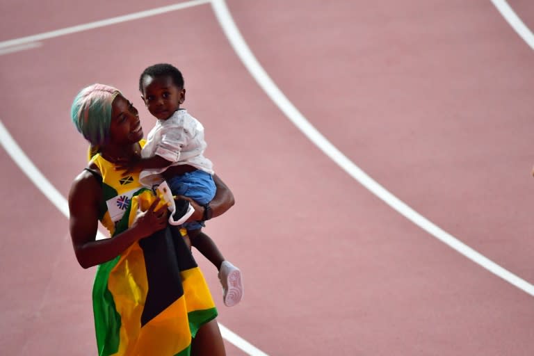 Shelly-Ann Fraser said after winning her fourth 100 metres world title it has been a long journey mentally and physically coming back after the birth of her son Zyon (AFP Photo/Giuseppe CACACE)