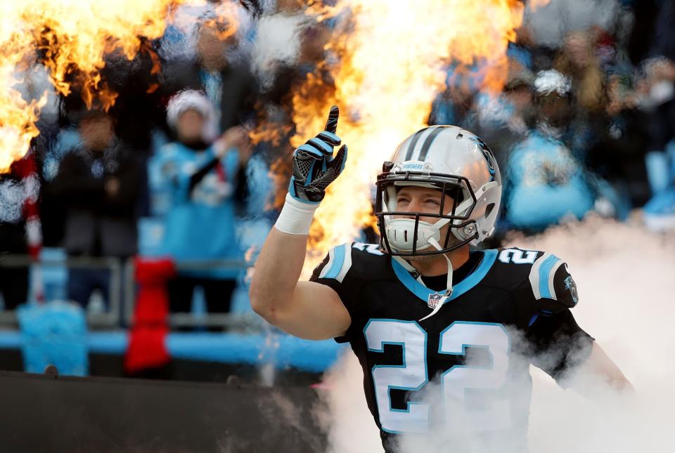 CHARLOTTE, NC - DECEMBER 24:  Christian McCaffrey #22 of the Carolina Panthers takes the field before their game against the Tampa Bay Buccaneers at Bank of America Stadium on December 24, 2017 in Charlotte, North Carolina.  (Photo by Streeter Lecka/Getty Images)