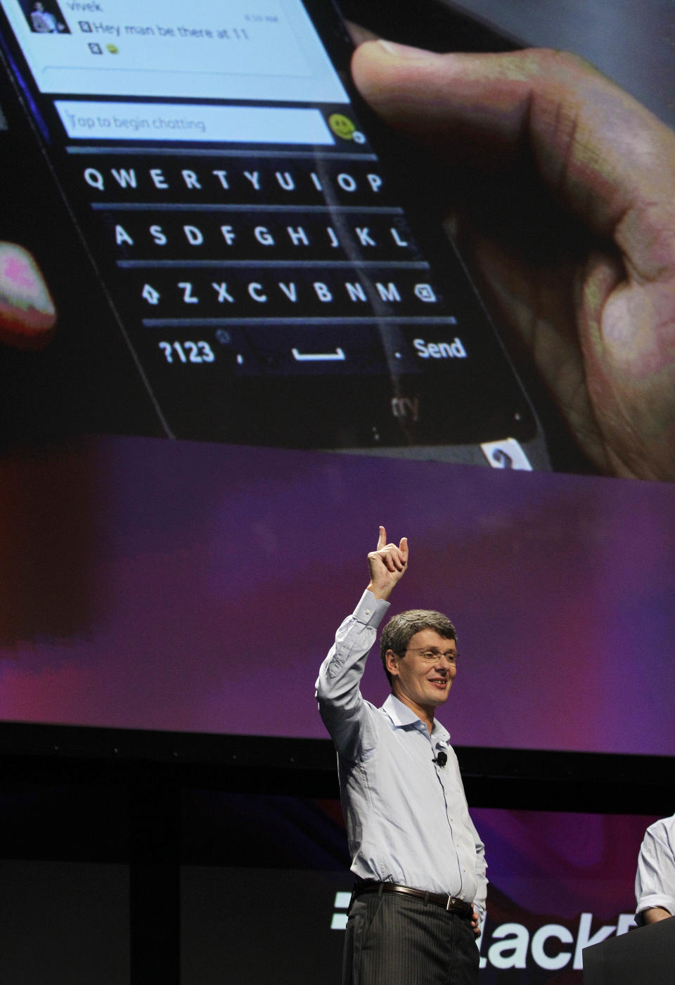 FILE-In this Tuesday, Sept. 25, 2012, file photo, Thorsten Heins, President and CEO of Research in Motion, speaks during a demonstration of the new BlackBerry 10 at the BlackBerry Jam Americas conference in San Jose, Calif. BlackBerry-maker Research In Motion posted another large loss in the second quarter but not as bad as analysts expected. Shares surged nearly 18 percent in after-hours trading. The Canadian company reported Thursday, Sept. 27, 2012, that it lost $235 million, or 45 cents a share, in its fiscal second quarter, which ended Sept 1. That compares with a profit of $419 million, or 80 cents per share, a year ago. (AP Photo/Eric Risberg, File)