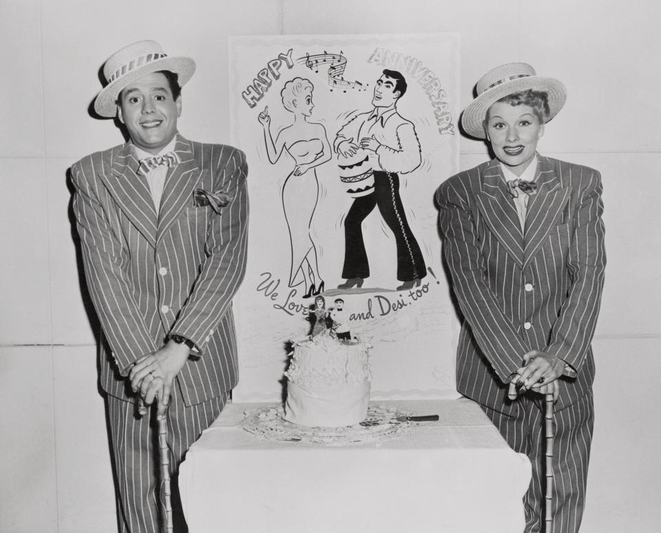 Ball (seen here with Desi Arnaz) wears a suit in this undated photo taken during for an anniversary party in the 1950s.