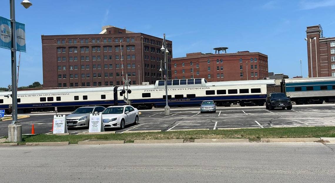 Two voters waited in their cars for someone to assist them at Union Station in Kansas City, where the city election board offered curbside voting Tuesday.