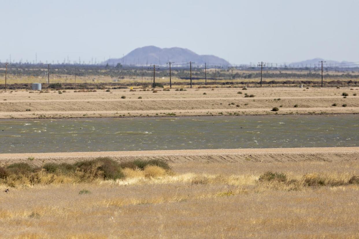 Water flows in a channel in the desert.