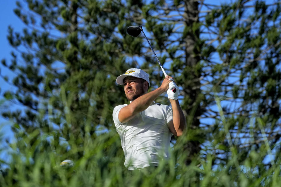 Xander Schauffele hits from the third tee during the third round of The Sentry golf event, Saturday, Jan. 6, 2024, at Kapalua Plantation Course in Kapalua, Hawaii. (AP Photo/Matt York)