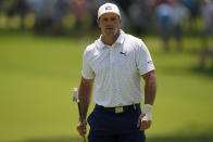 Bryson Dechambeau walks to the 13th green during a practice round for the PGA Championship golf tournament, Wednesday, May 18, 2022, in Tulsa, Okla. (AP Photo/Eric Gay)