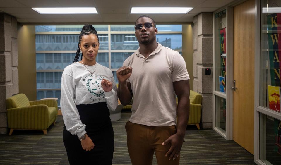 Ayanna Adams, 29, an undergraduate student at Wayne State University majoring in psychology with a law minor, stands next to Wayne State's Black Student Union President Donte Reed, 21, inside the Wayne State University campus in Detroit on Wednesday, Sept. 27, 2023. Adams serves on the executive board of Wayne State's Black Student Union and is the community outreach chair. On Oct. 31, the Black Student Union will present its first-ever "Trunk or Treat" event at the Wayne State Fieldhouse to provide another safe place for Detroit children to have fun on Halloween.