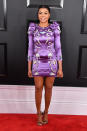 <p>Rocking Jimmy Choos and an embroidered, bright lavender Marc Jacobs dress. </p>