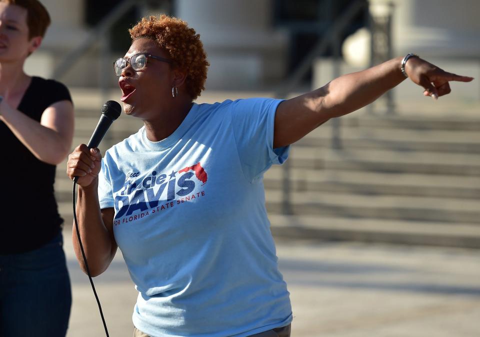 State Rep. Tracie Davis, shown  talking to a crowd outside the Duval County Courthouse during a May demonstration regarding abortion rights, is running to represent District 5 in the Florida Senate.