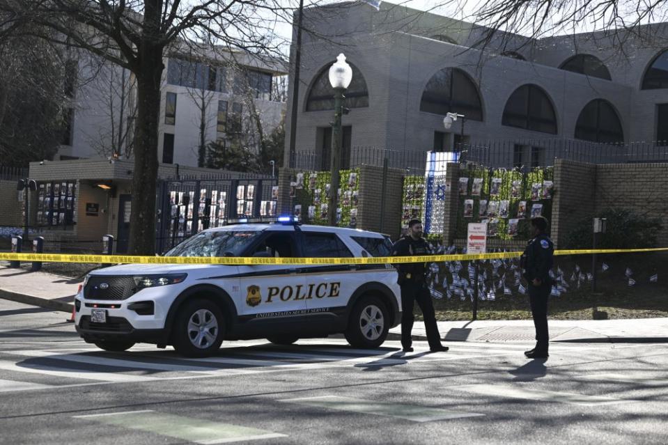 Police take security measures and investigate the crime scene after 25-year-old Aaron Bushnell, an active-duty member of the US Air Force, set himself on fire Sunday outside the Israeli Embassy in Washington, D.C., in protest against the war in Gaza, on February 25, 2024.<span class="copyright">Celal Gunes—Anadolu/Getty Images</span>