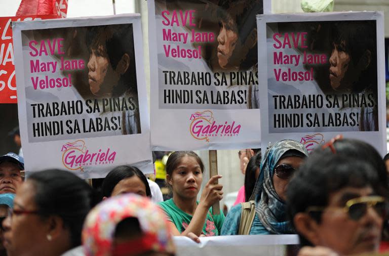 Activists hold a protest in support of Mary Jane Veloso outside the Indonesian embassy in Manila, on April 24, 2015