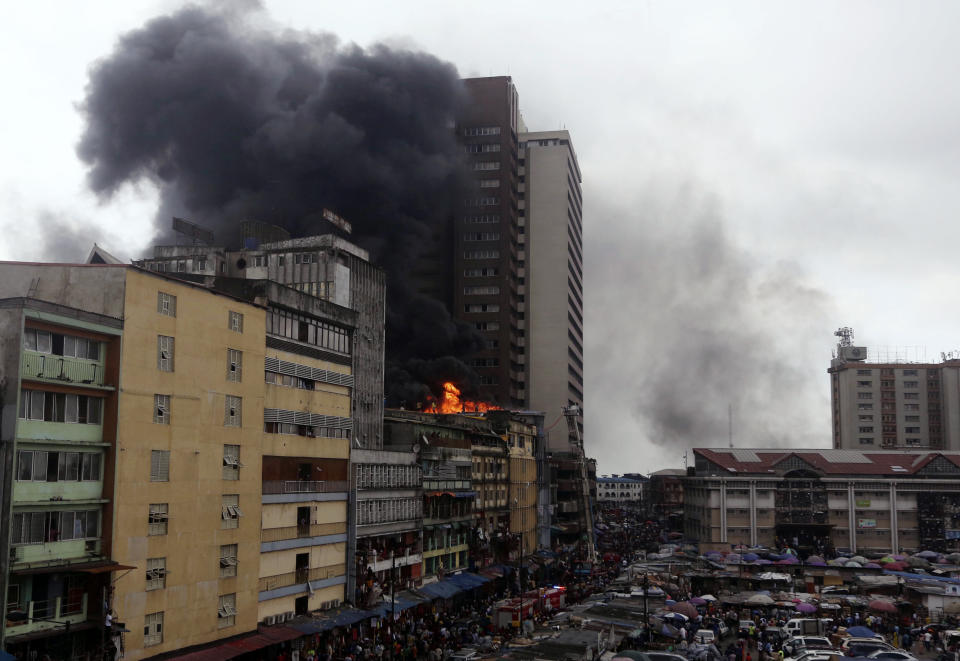 Smoke rises from a fire in downtown Lagos, Nigeria, Tuesday, Nov. 5, 2019. (Photo: Sunday Alamba/AP)