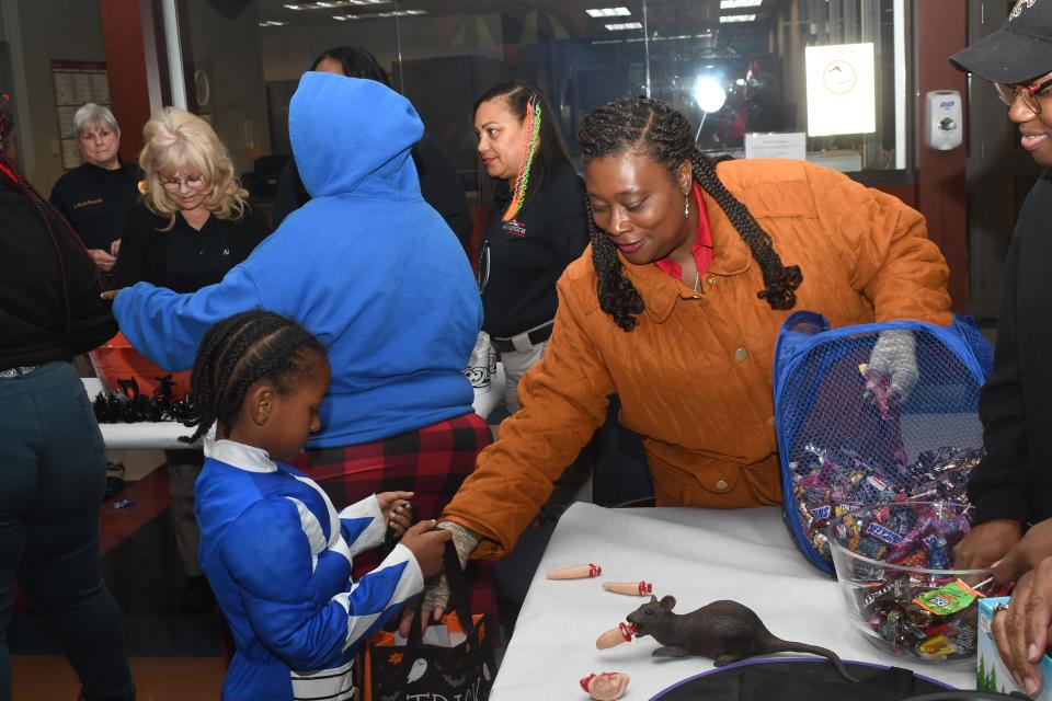 Alexandria (Louisiana) Police Department staff hand out treats to trick-or-treaters at the Public Safety Complex on Oct. 31, 2023.