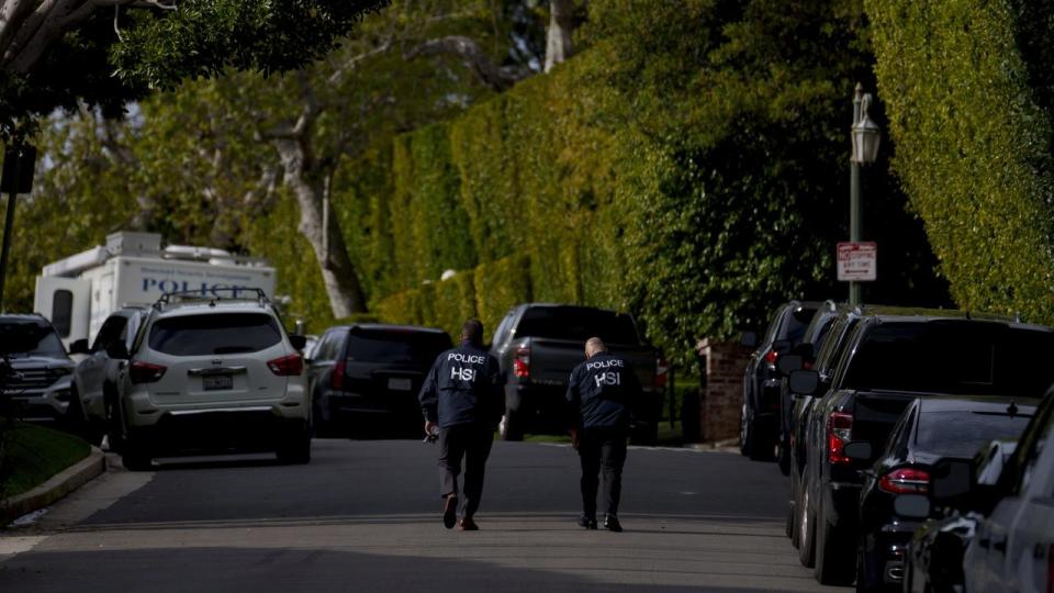 Police raid a house