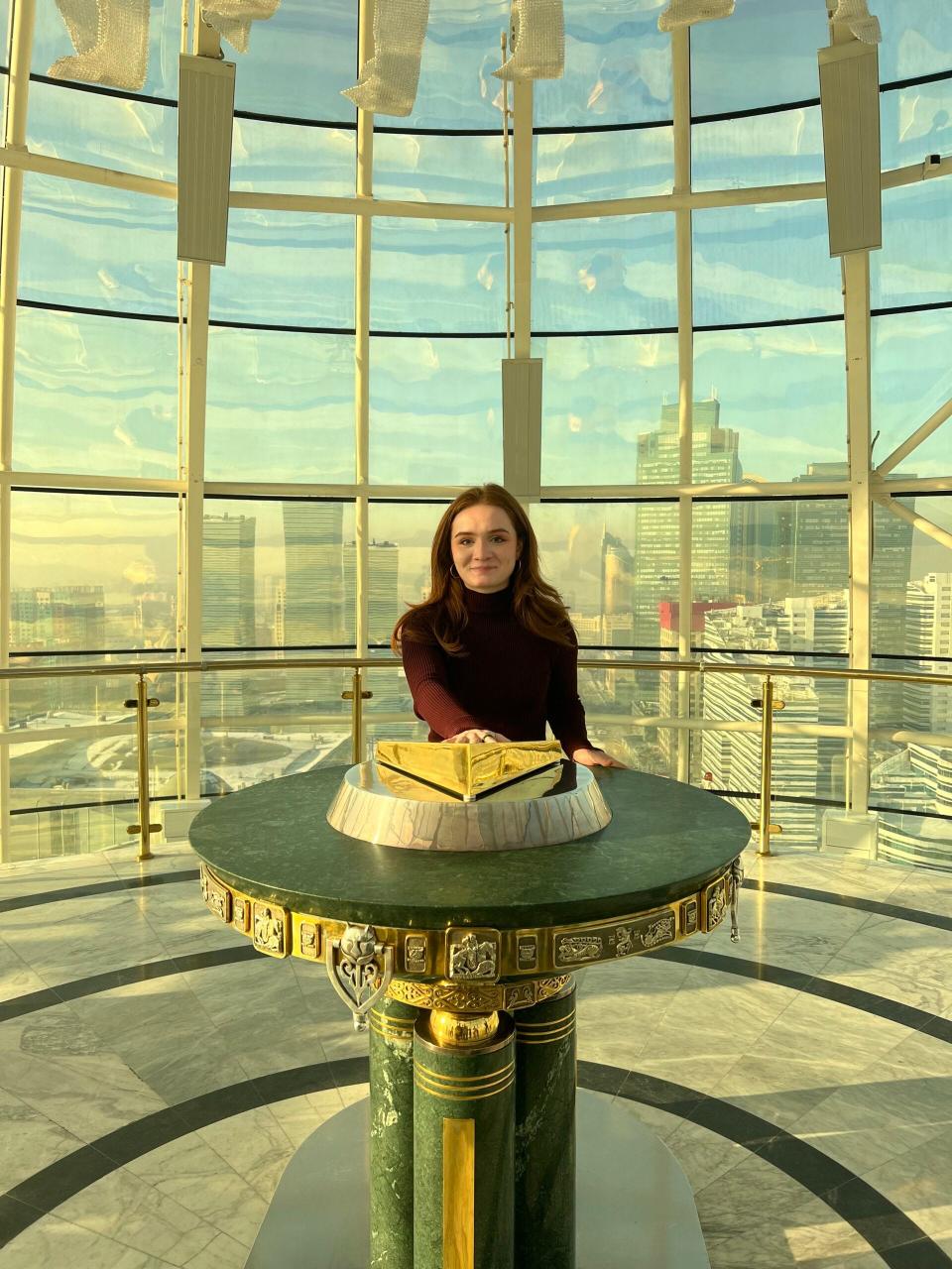 Natalie Navarette stands on top of Baiterek in Almaty, Kazakhstan. This is a symbol of Kazakhstan’s independence and Kazakhstan’s first president placed his hand on that podium which now has his handprint.
