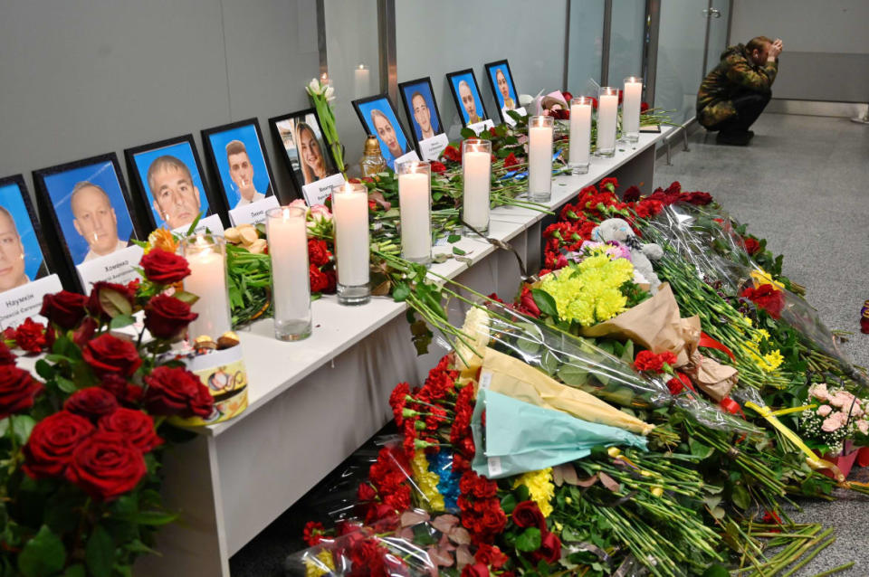 <div class="inline-image__caption"><p>"A man sits by a memorial for the victims of the Ukraine International Airlines Boeing 737-800 crash in the Iranian capital Tehran, at the Boryspil airport outside Kiev on January 8, 2020."</p></div> <div class="inline-image__credit">Sergei Supinsky/Getty</div>