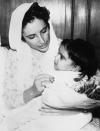 <p>When Bhutto, who was the first-ever female leader of a Muslim nation, gave birth to her daughter Bakhtawar (shown here) in 1990, she had been in office just a little over a year. Her first child was born just a couple of months before she took office in 1988, and her third child was also an infant when she took office for the second time. (AP Photo) </p>