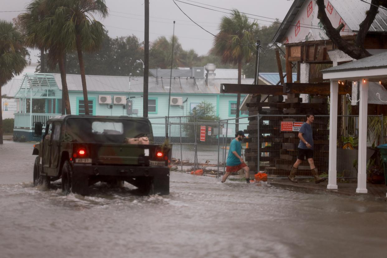 A Florida National Guard vehicle drives through a flooded street caused by the rain and storm surge from Hurricane Debby on August 05, 2024, in Cedar Key, Florida (Getty Images)