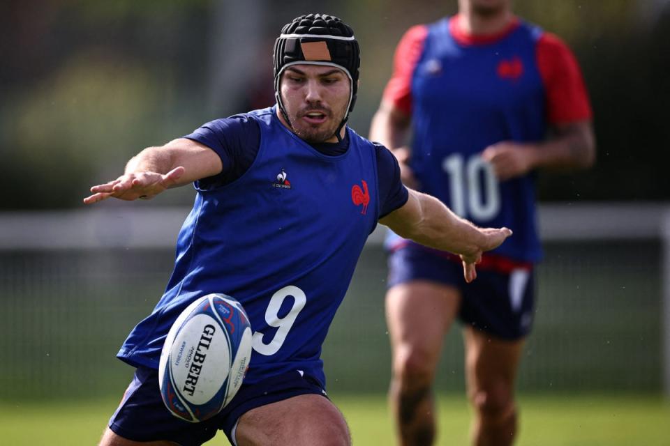 Antoine Dupont will wear a scrum cap for added protection as he recovers from a fractured cheekbone (AFP via Getty Images)