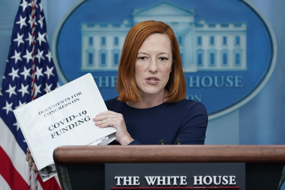 FILE - White House press secretary Jen Psaki holds up a binder as she speaks during the daily briefing at the White House in Washington, April 6, 2022. Psaki, whose last day on the job is Friday, has answered reporters' questions nearly every weekday of the almost 500 days that Biden has been in office. That makes her a top White House communicator and perhaps the administration's most public face, behind only the president and Vice President Kamala Harris. Her departure could complicate how Biden's message gets out at a critical time for him, at least in the short term. (AP Photo/Susan Walsh, File)